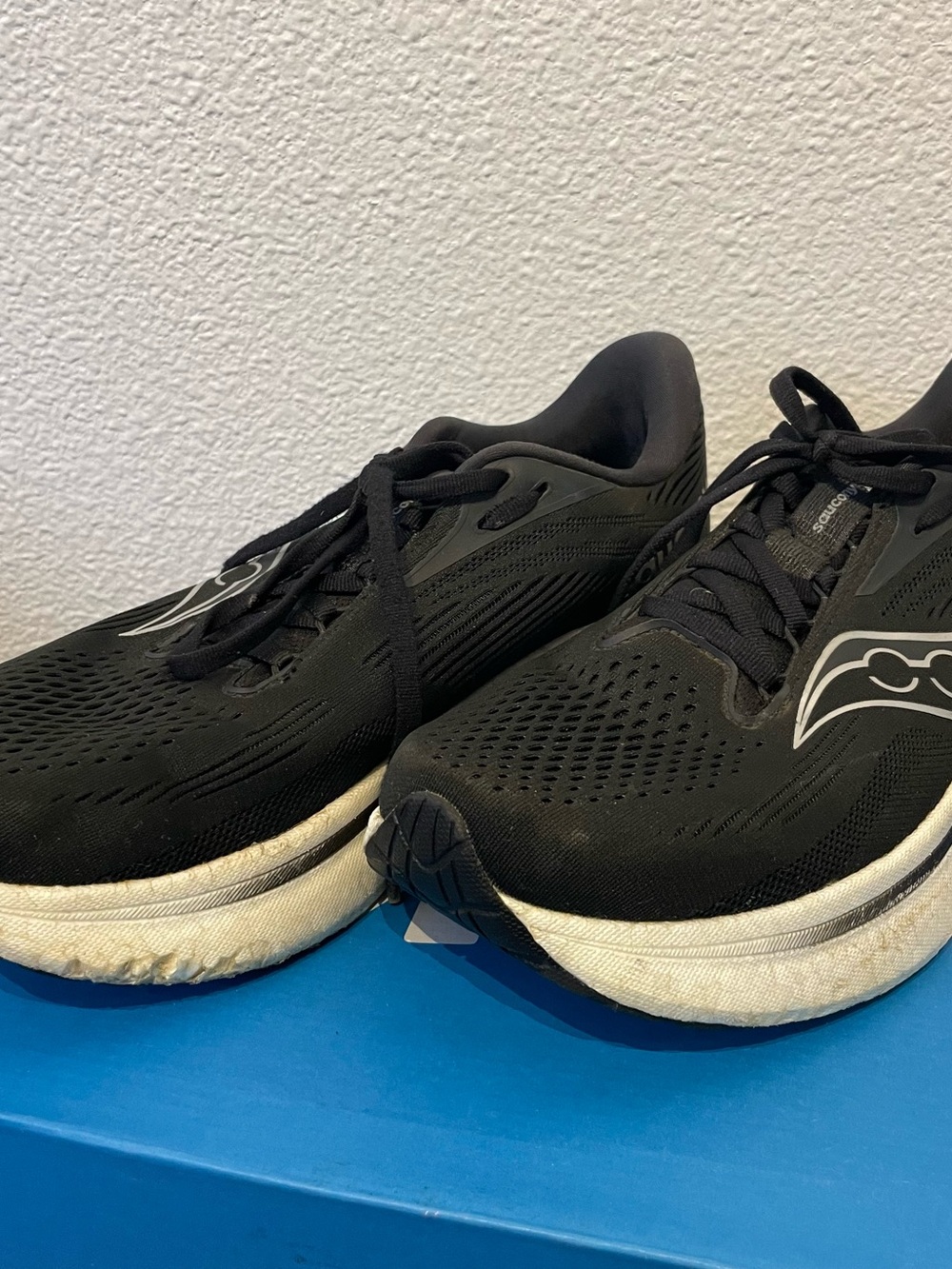 Saucony Black Running Shoes with White Midsole